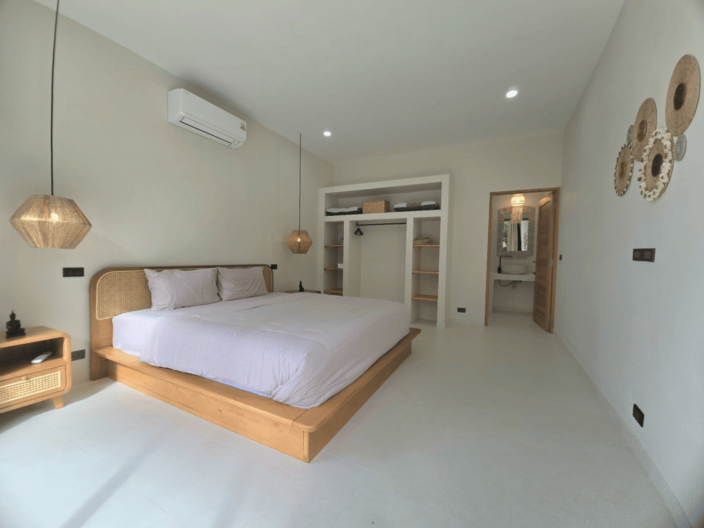 modern bedroom with wooden furniture in a luxury villa